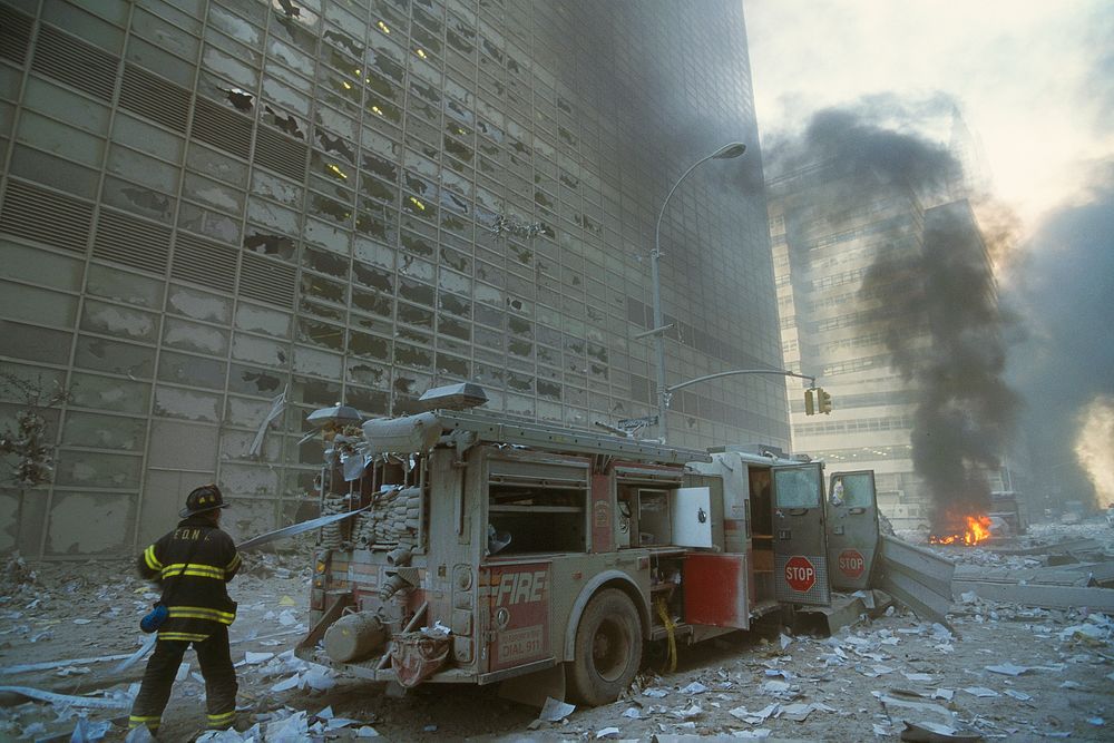 Rescue officer and rescue truck during the aftermath of the September 11 terrorist attack on the World Trade Center, New…