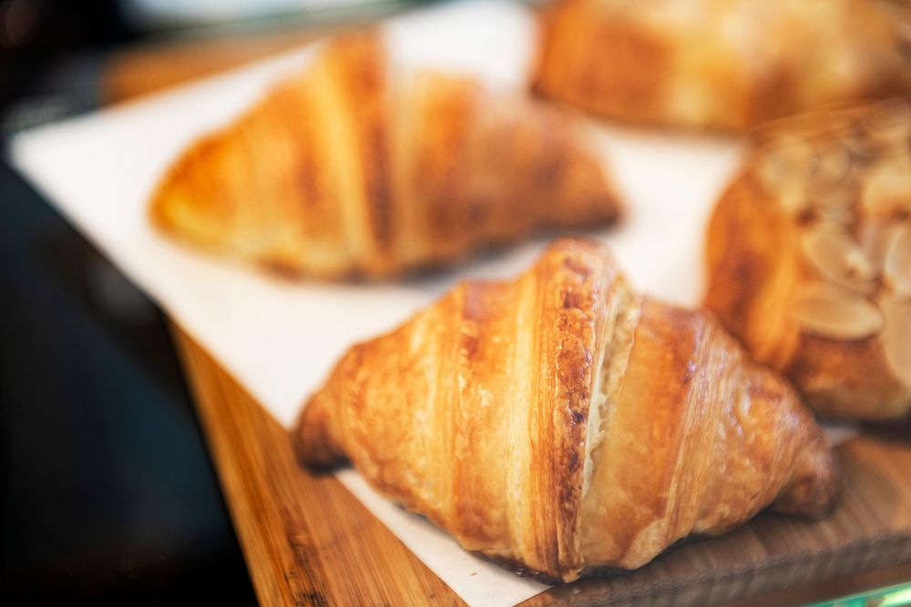 Fresh baked butter croissants on display at a cafe