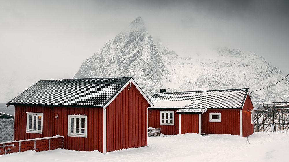 Winter desktop wallpaper background, red cabins on a snowy Sakrisoy island, Norway