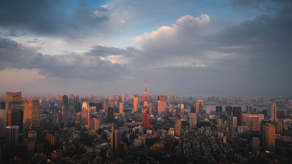 Travel desktop wallpaper background, downtown Tokyo, Japan drone photograph