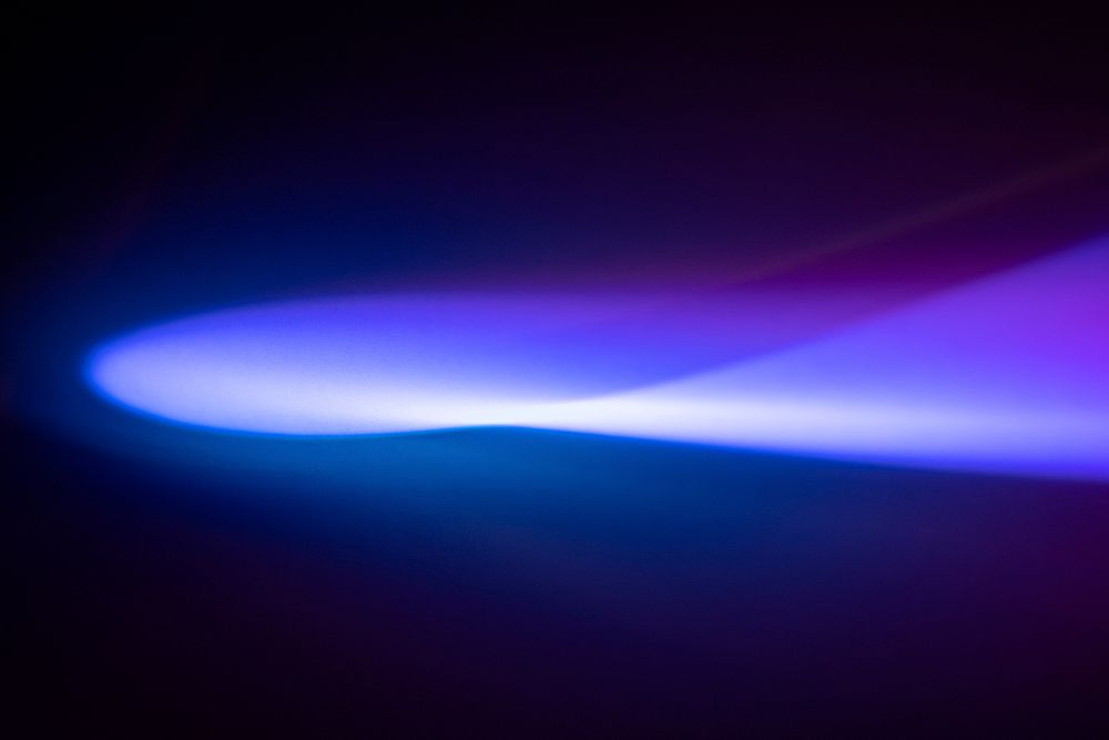 Gradient background with blue and purple light effect