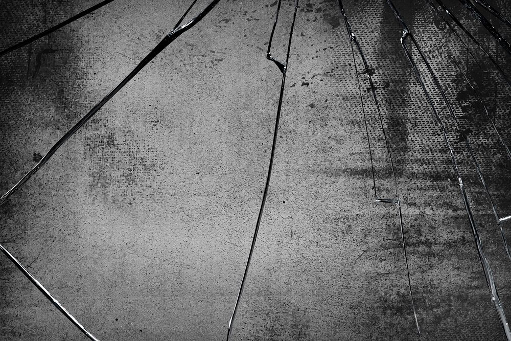 Grunge background with cracked glass texture