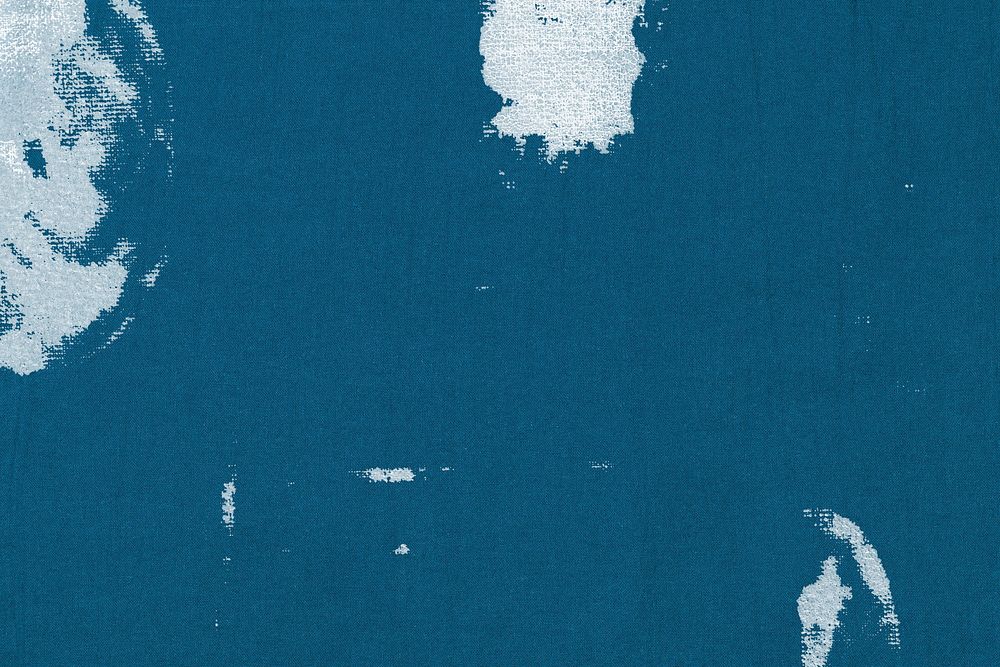 Blue textured background with white fabric stain