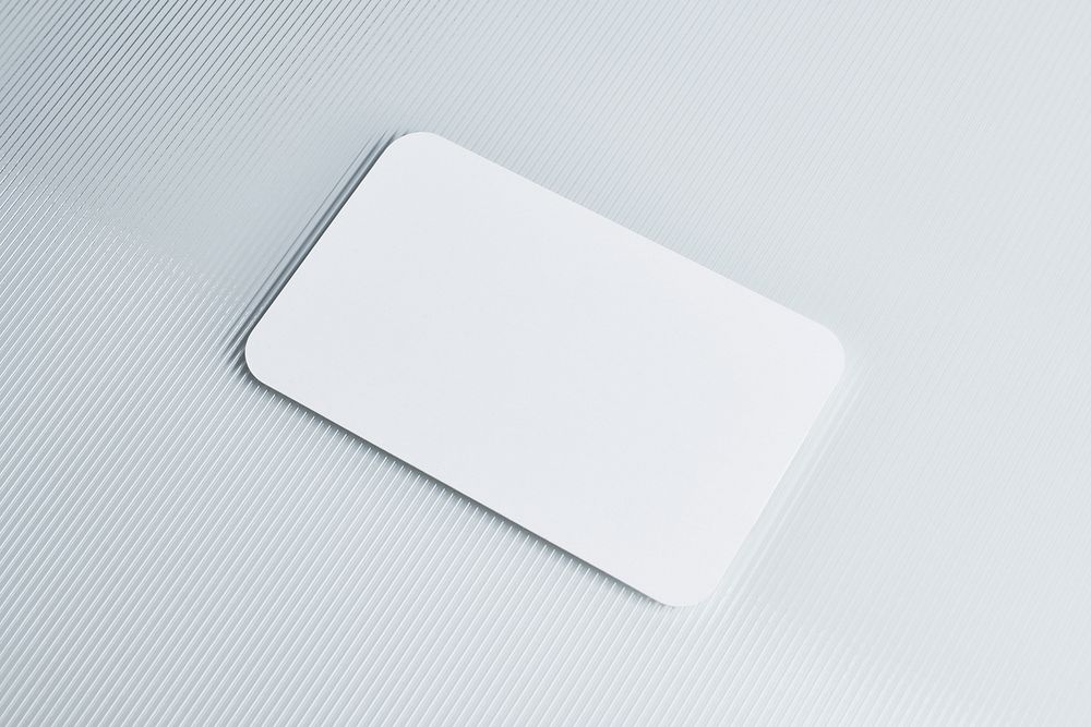 Blank white card on pattern glass