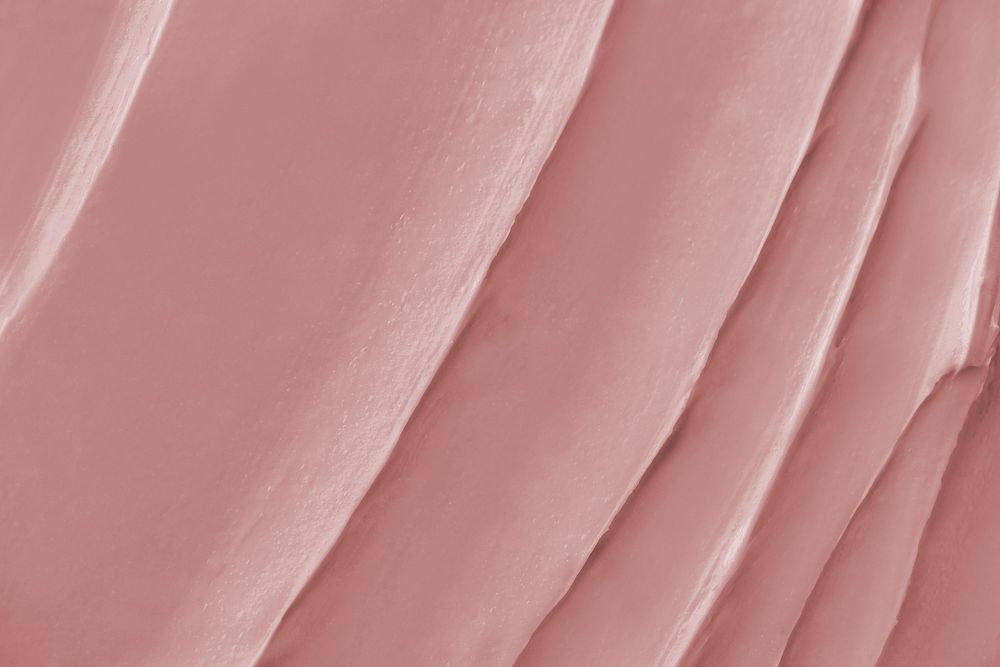 Pink frosting texture background close-up