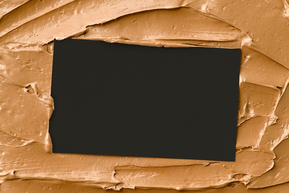 Caramel frosting texture background with business card