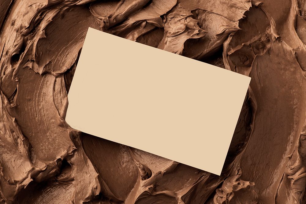 Chocolate frosting texture background with business card