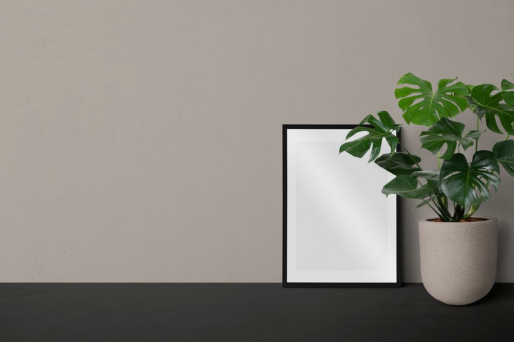 Blank minimal black frame against a wall