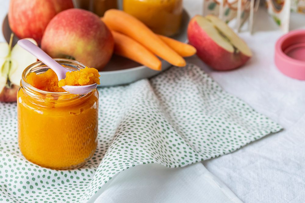 Homemade carrot puree baby food in a jar