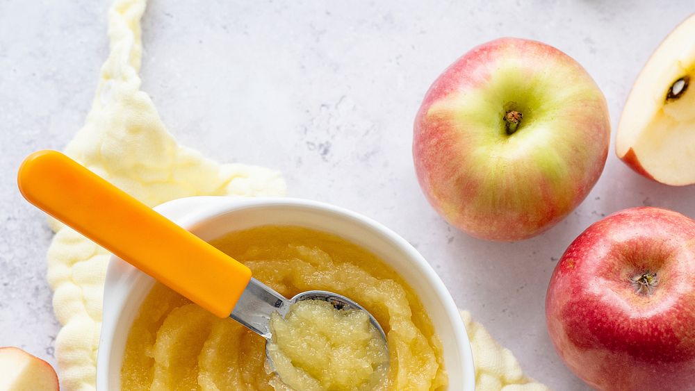 Homemade apple puree healthy baby food image