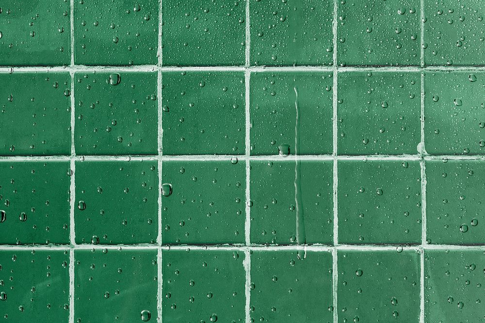 Green tiles background, water dripping