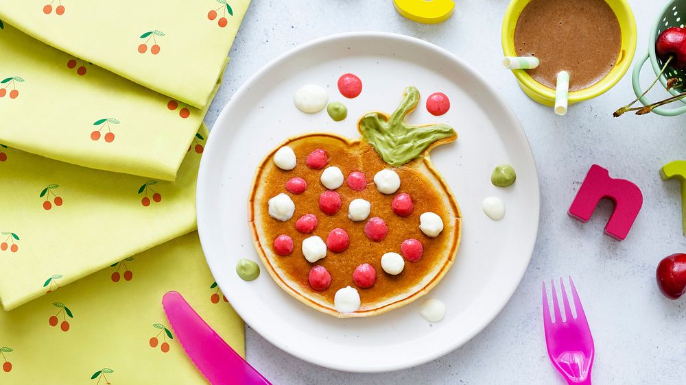 Kids pancake breakfast treat background, fun strawberry shape