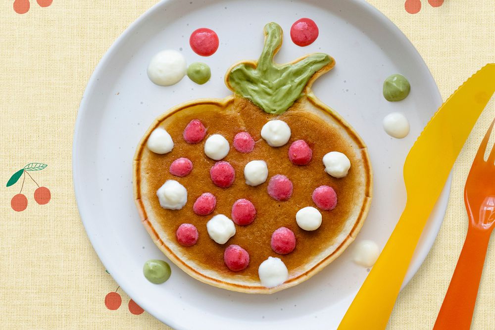 Kids pancake breakfast treat background, shaped like a fun strawberry wallpaper 