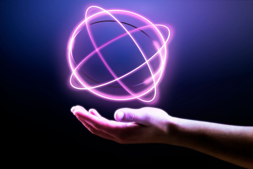 Atom hologram background showing on man&rsquo;s hand science technology remix