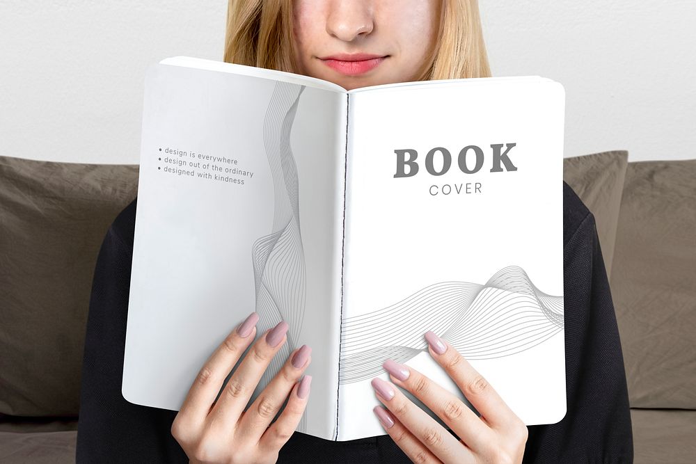 Blonde woman reading a book closeup