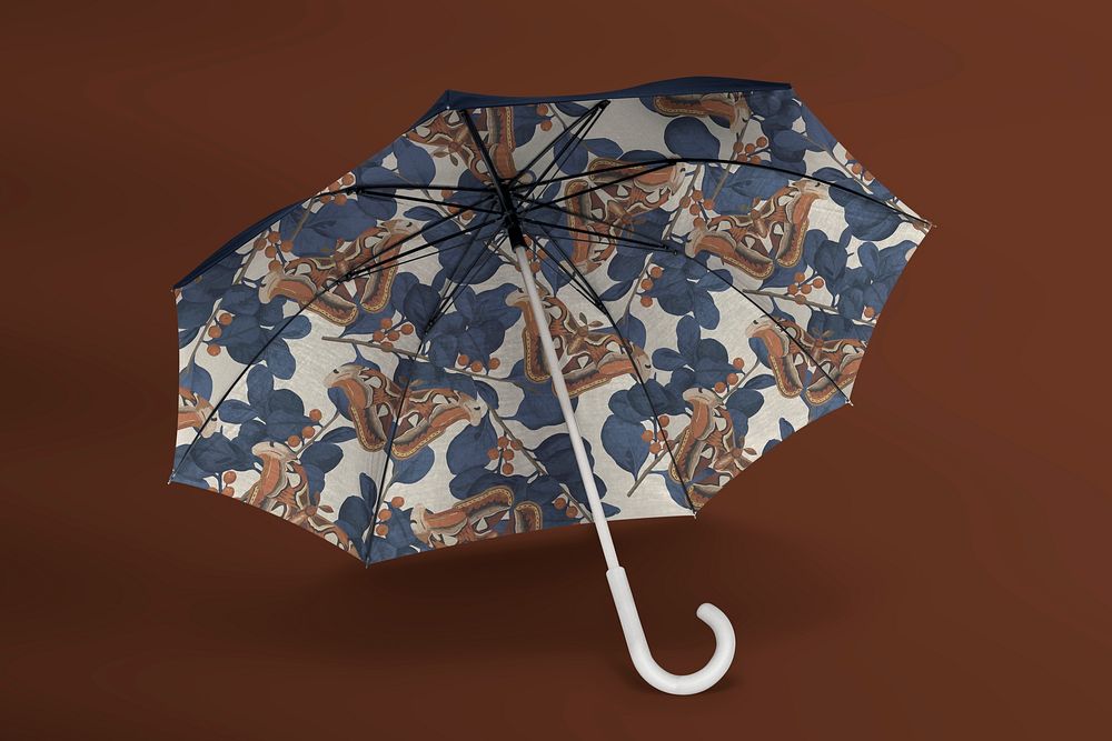 Vintage patterned umbrella with butterfly graphic