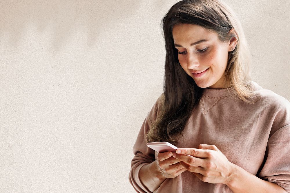 Woman holding smartphone background in the new normal remixed media with leaf shadow