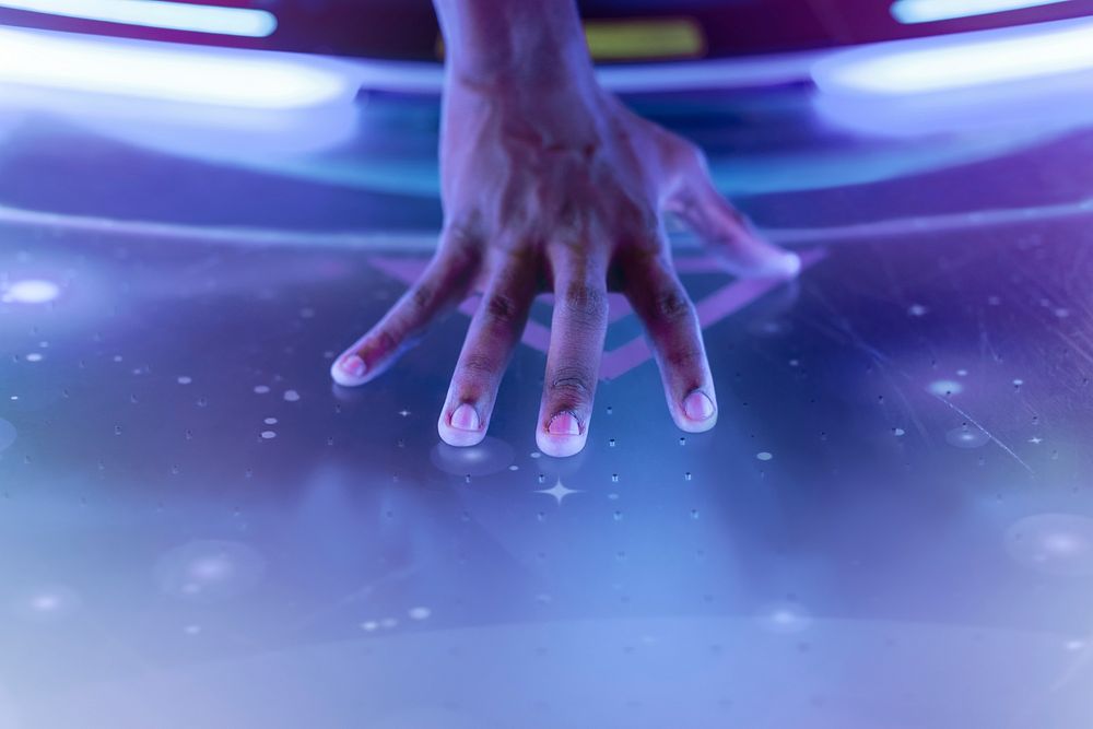 Performer&rsquo;s hand touching concert stage closeup