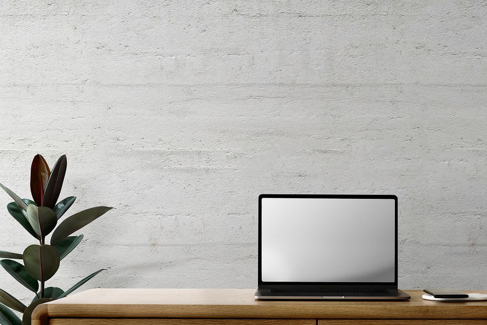 Laptop screen mockup psd on a desk loft home office zone design