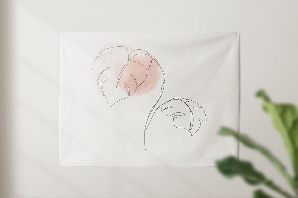 White wall tapestry with window shadow