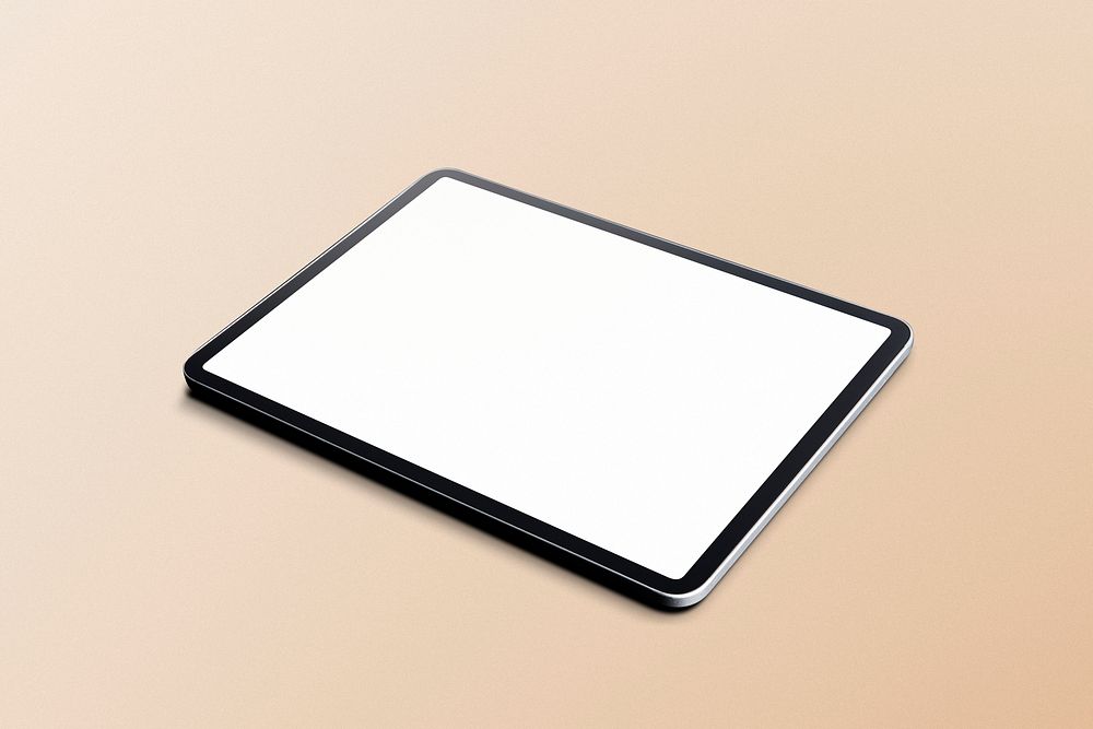 Blank tablet screen on beige background
