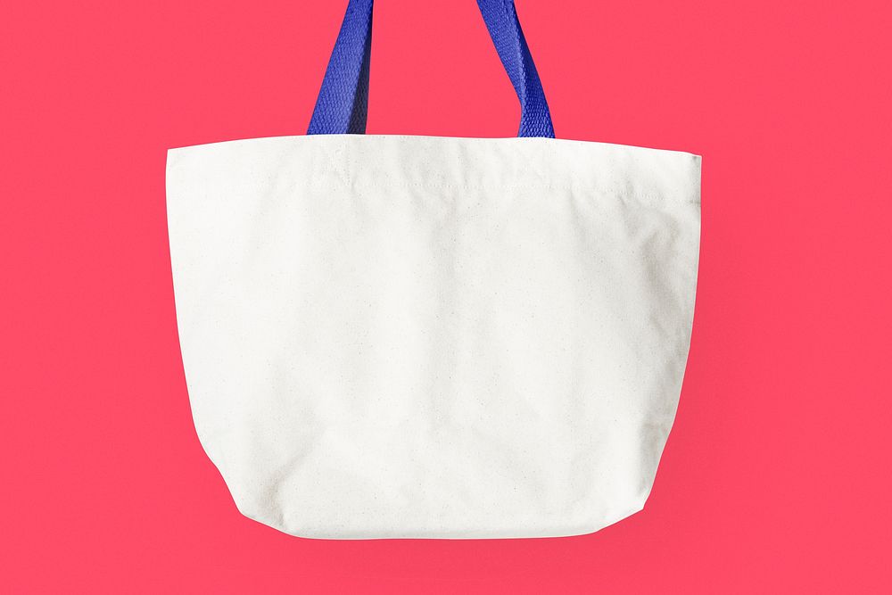 White tote bag on pink background