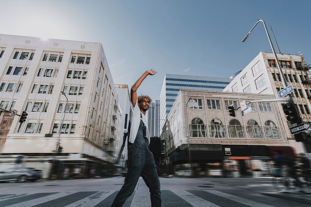 African American man crossing road, urban fashion candid