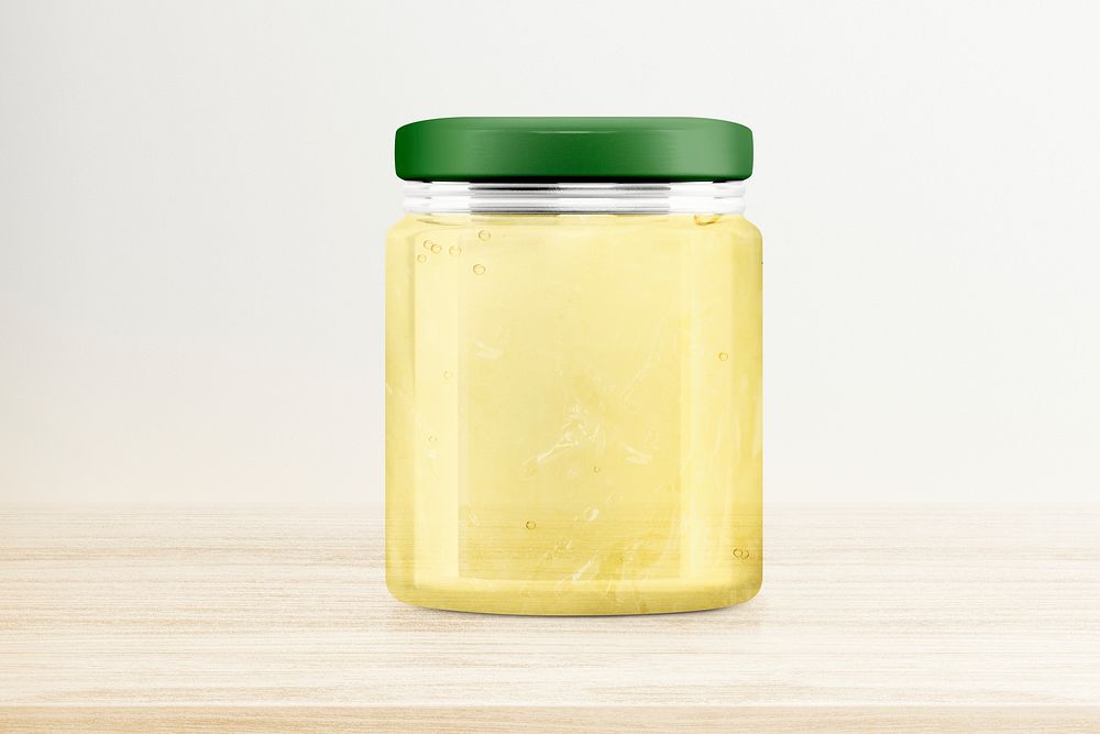 Lemon jelly jar on wooden table