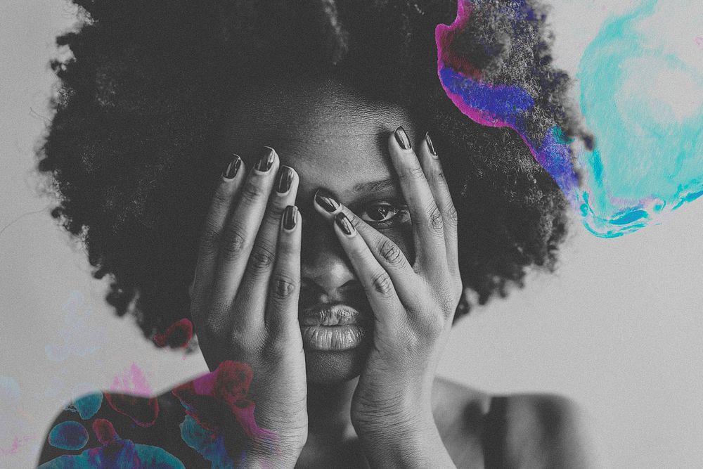 Afro woman covering face, mental health concept, black and white image