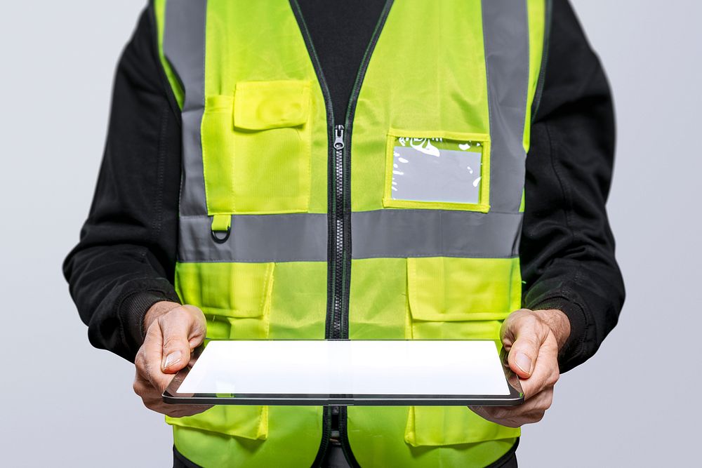Male engineer holding a digital tablet