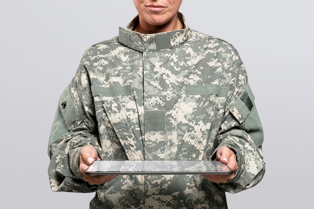 Female soldier holding a tablet army technology
