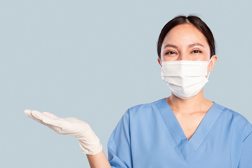 Female doctor with a presenting hand gesture