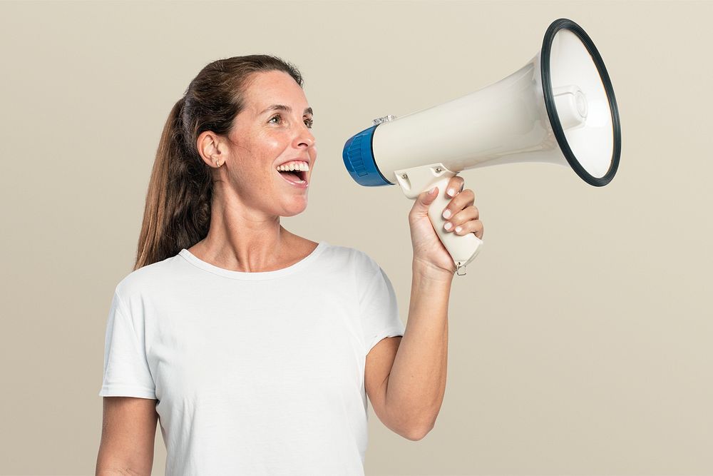 Female activist with a megaphone with design space