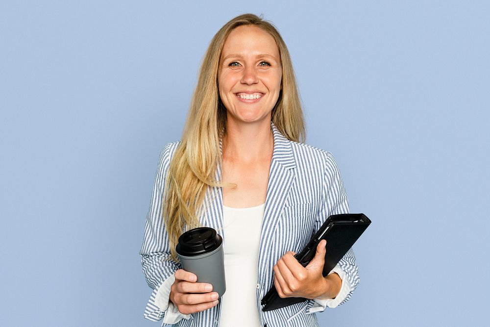 Businesswoman holding coffee cup