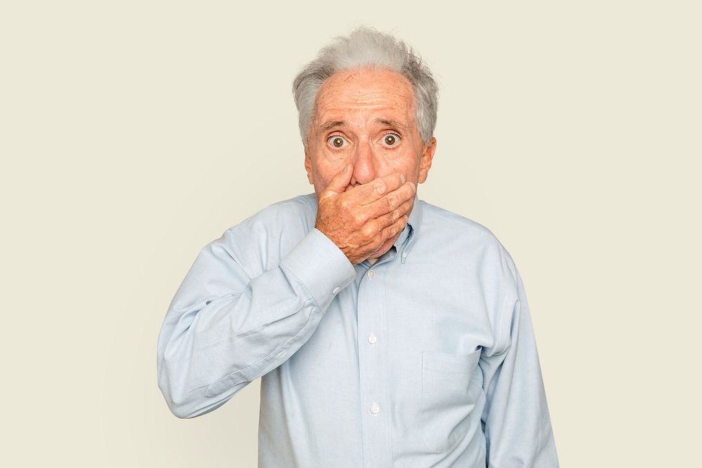 Shocked senior man mockup psd with hand covering his mouth