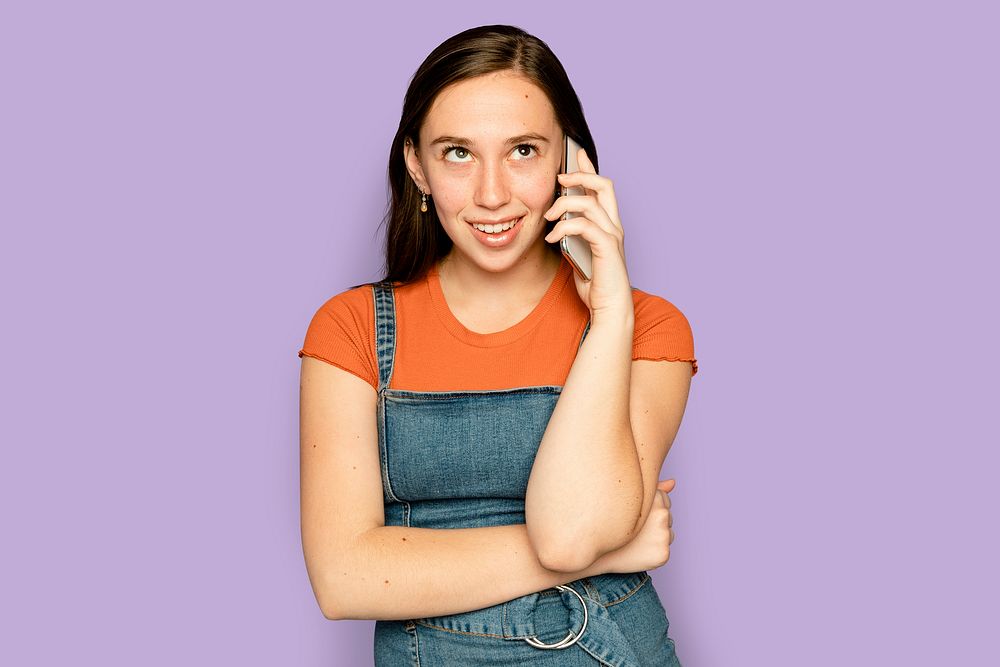 Beautiful woman having a phone call digital device