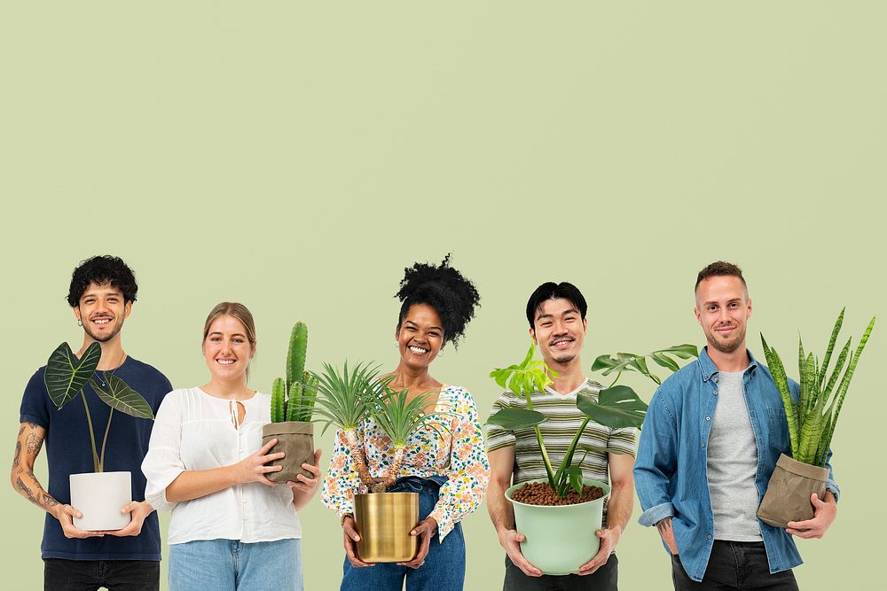 Happy plant lovers holding their potted plants