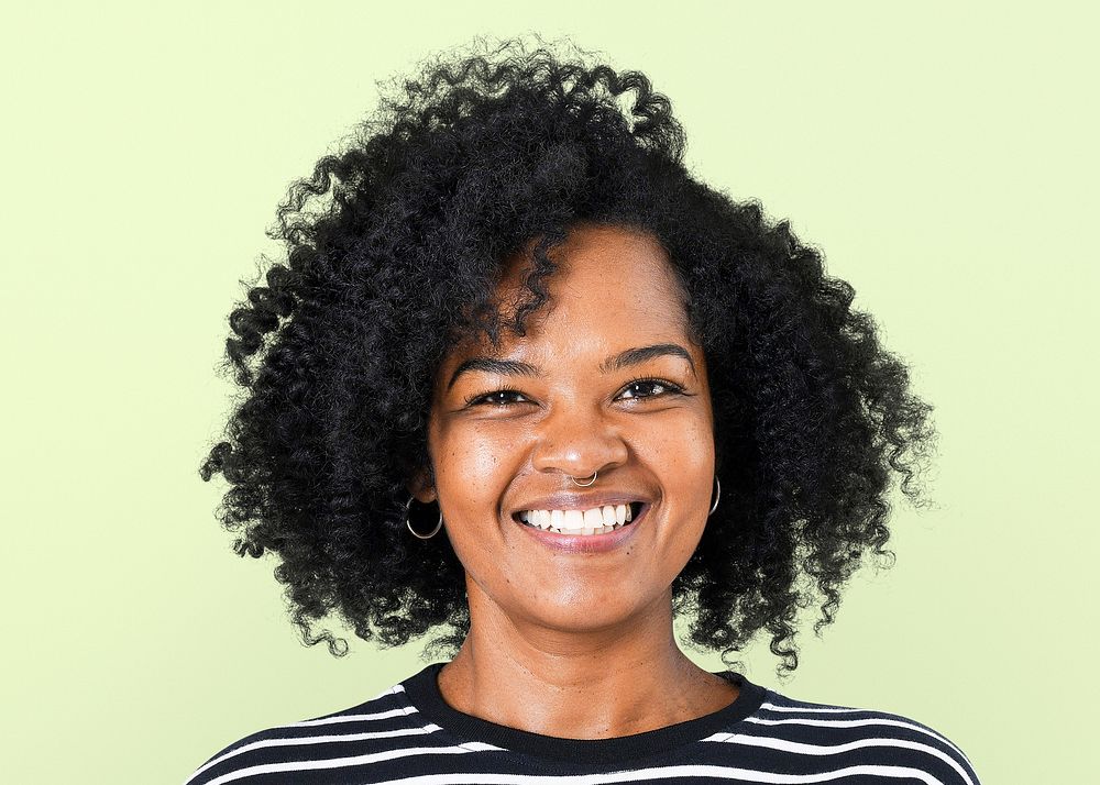 Smiling African young woman, face portrait