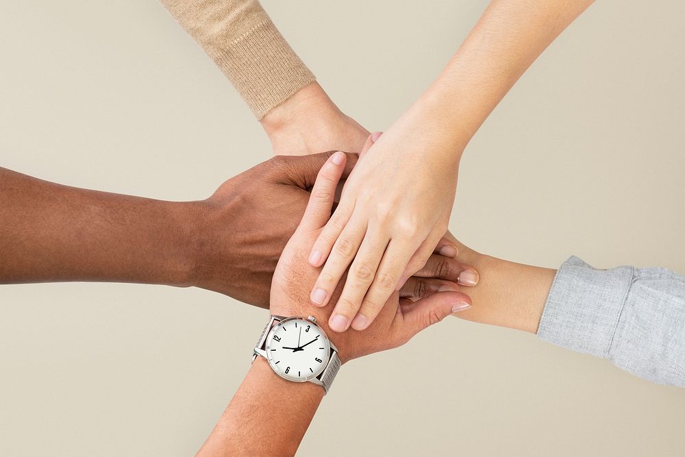 Diverse hands united  business teamwork gesture