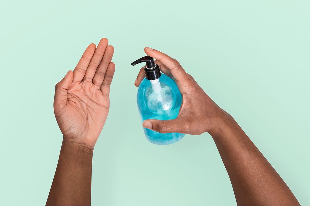 Covid-19 hand sanitizing in health concept