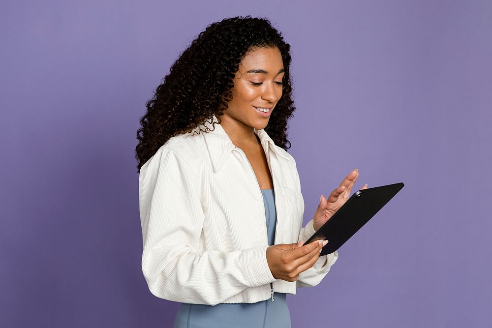 Businesswoman using digital tablet for work