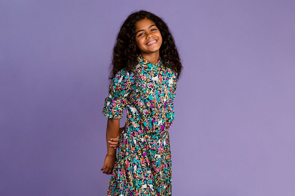 Cute little girl wearing a floral dress