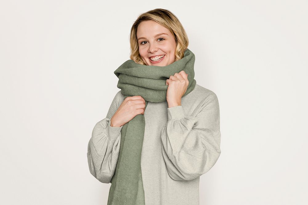 Woman wearing scarf, isolated on off white