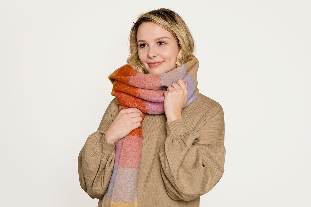 Blonde woman wearing warm scarf psd