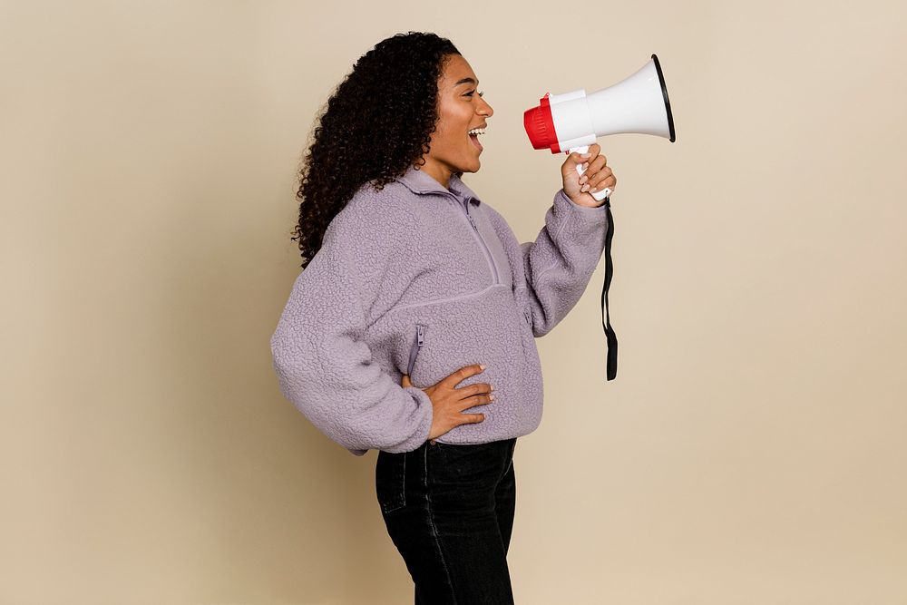 Feminist with megaphone shouting out message