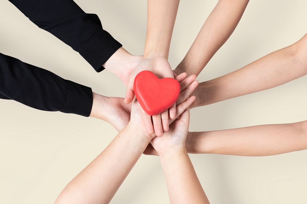 Hands united heart community of love