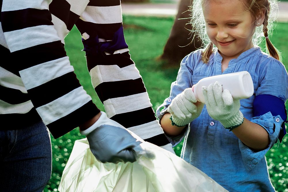 Plastic pollution awareness with girl sorting garbage