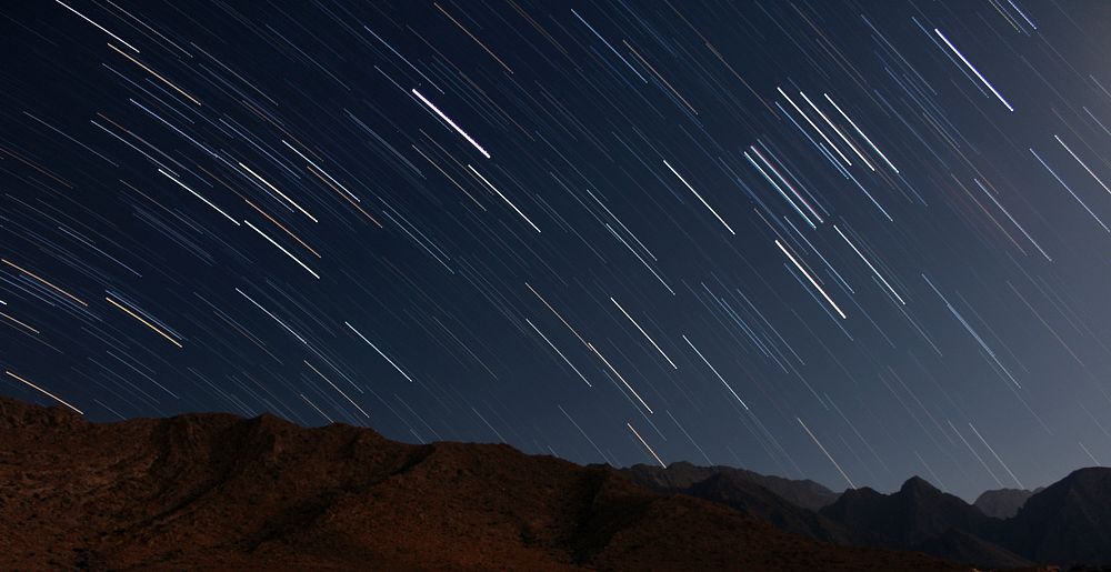 Beautiful meteor shower. Original public domain image from Wikimedia Commons