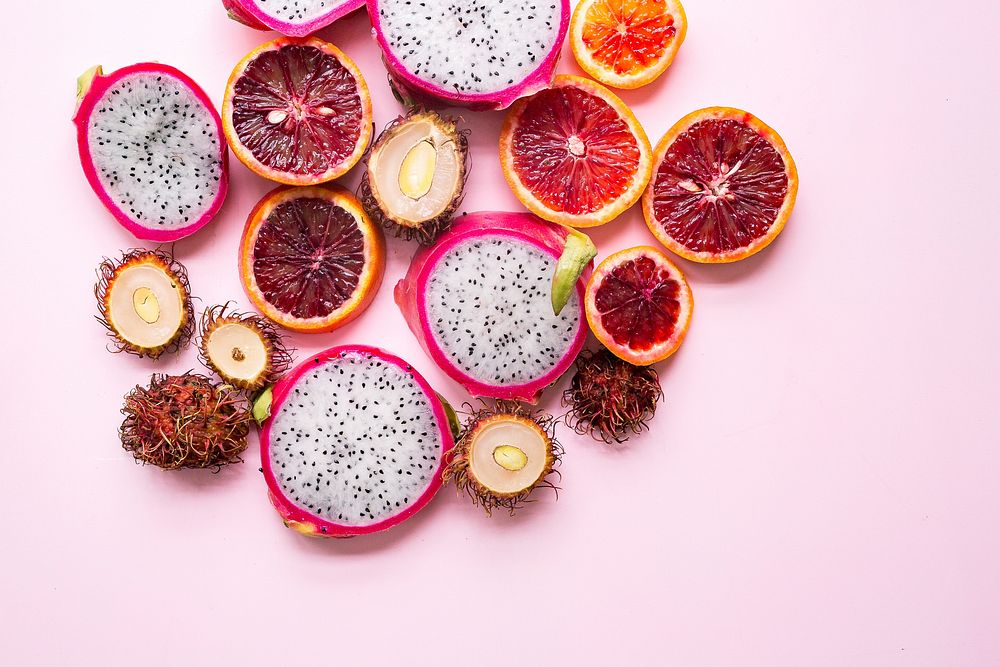 Slices of blood oranges, dragon fruit, and tropical fruit. Original public domain image from Wikimedia Commons