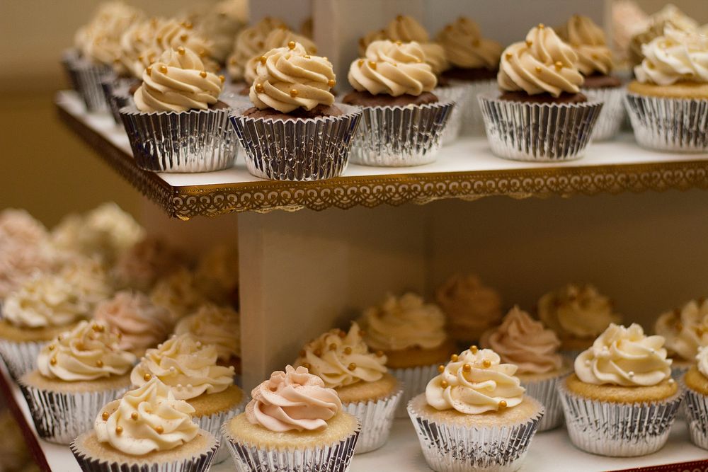 Tiers of mini cupcakes with caramel frosting. Original public domain image from Wikimedia Commons